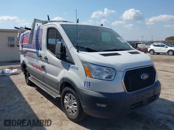 ✅ 2021 Ford Transit Cargo • VIN: 1FTBR1Y8XMKA44063 • Lot: 43065150. Wystawiony na IAAI z przebiegiem 76 513 mil. Bezpłatny archiwum sprzedaży aukcyjnych z USA i szczegółowy raport historii pojazdu na DreamBid. Zdjęcie 1.