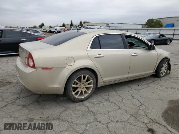 ✅ 2009 Chevrolet Malibu LTZ • VIN: 1G1ZK577394186522 • Lot: 82720965. Listed on Copart with 152,320 mi. Free auction sales archive from the USA and detailed vehicle history report at DreamBid. Image 3.