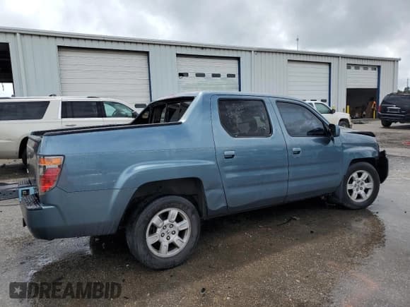 ✅ 2007 Honda Ridgeline RTL • VIN: 2HJYK16517H520652 • Lot: 68702815. Listed on Copart with 319,536 mi. Free auction sales archive from the USA and detailed vehicle history report at DreamBid. Image 3.