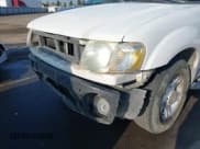 ✅ 2003 Ford Explorer Sport Trac XLS • VIN: 1FMZU67E43UA81139 • Lot: 43526364. Listed on IAAI with 155,028 mi. Free auction sales archive from the USA and detailed vehicle history report at DreamBid. Image 18.