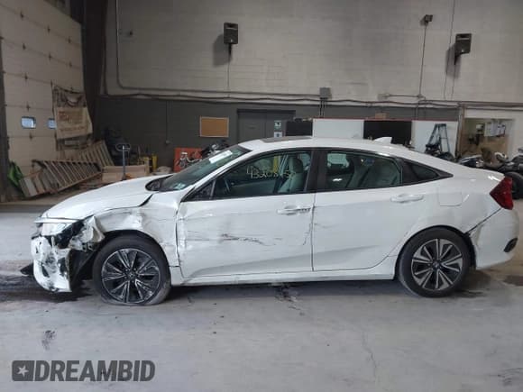 ✅ 2017 Honda Civic EX-L • VIN: 19XFC1F76HE208396 • Lot: 43208450. Listed on IAAI with 75,981 mi. Free auction sales archive from the USA and detailed vehicle history report at DreamBid. Image 6.