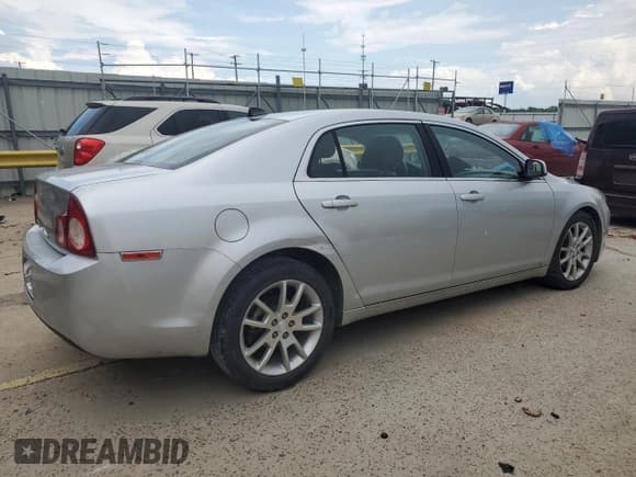✅ 2012 Chevrolet Malibu LTZ 1LZ • VIN: 1G1ZE5E03CF215820 • Lot: 56957954. Listed on Copart with 114,604 mi. Free auction sales archive from the USA and detailed vehicle history report at DreamBid. Image 3.