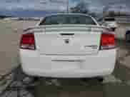 2009 Dodge Charger SXT с VIN 2B3KA33V69H576152, выставлен на аукционе Copart как лот 82020014 с пробегом 129 304 миль миль и Списание • Salvage title. История ставок и продаж доступна на DreamBid. Изображение 6.