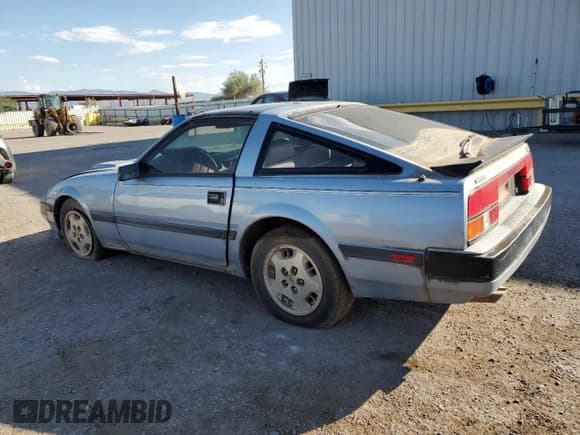 ✅ 1984 Nissan 300ZX • VIN: JN1CZ14S8EX017280 • Lot: 85945215. Listed on Copart with 107,512 mi. Free auction sales archive from the USA and detailed vehicle history report at DreamBid. Image 2.