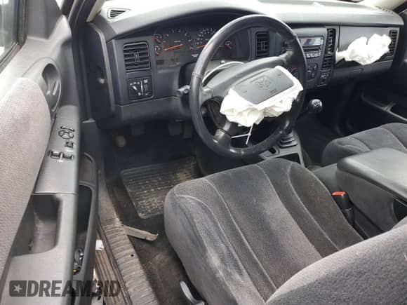 2004 Dodge Dakota Sport z VIN 1D7GL32NX4S584715, wystawiony jako Copart lot #54146225 z przebiegiem Nie podano mil oraz Nie do naprawy • Non repairable. Historia ofert i sprzedaży dostępna na DreamBid. Obrazek 8.