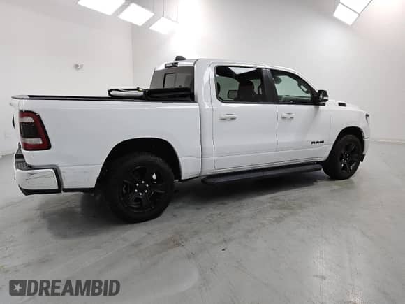 2022 Ram 1500 Big Horn with VIN 1C6SRFFT8NN319828, listed as a Copart auction lot 85266885 with 117,667 mi miles and Clean title. Bid and sale history available at DreamBid. Image 3.