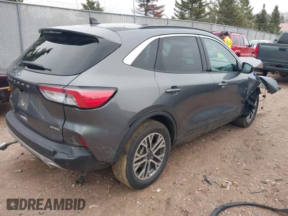 ✅ 2021 Ford Escape SEL • VIN: 1FMCU0H60MUA56833 • Lot: 42080822. Listed on IAAI with 64,850 mi. Free auction sales archive from the USA and detailed vehicle history report at DreamBid. Image 4.