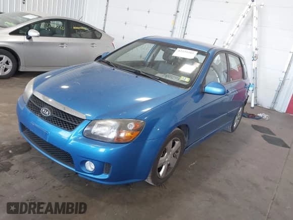 ✅ 2008 Kia Spectra • VIN: KNAFE162485017759 • Lot: 42233285. Listed on IAAI with 165,412 mi. Free auction sales archive from the USA and detailed vehicle history report at DreamBid. Image 2.