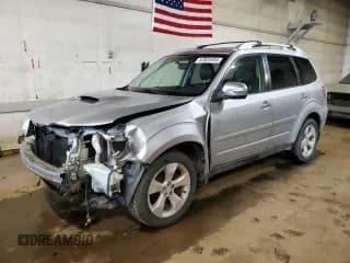 ✅ 2012 Subaru Forester XT Touring • VIN: JF2SHGGC1CH468868 • Lot: 62820355. Listed on Copart with 143,042 mi. Free auction sales archive from the USA and detailed vehicle history report at DreamBid. Image 1.