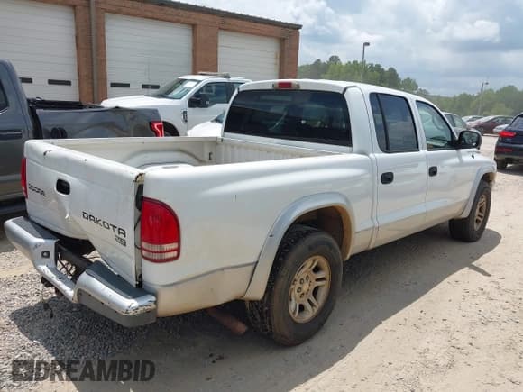 ✅ 2003 Dodge Dakota SLT • VIN: 1D7HL48X63S144573 • Lot: 42798150. Wystawiony na IAAI z przebiegiem 224 361 mil. Bezpłatny archiwum sprzedaży aukcyjnych z USA i szczegółowy raport historii pojazdu na DreamBid. Zdjęcie 4.