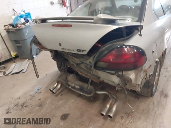✅ 2000 Pontiac Grand Am GT1 • VIN: 1G2NV12E9YM714403 • Lot: 42645935. Wystawiony na IAAI z przebiegiem 198 127 mil. Bezpłatny archiwum sprzedaży aukcyjnych z USA i szczegółowy raport historii pojazdu na DreamBid. Zdjęcie 6.