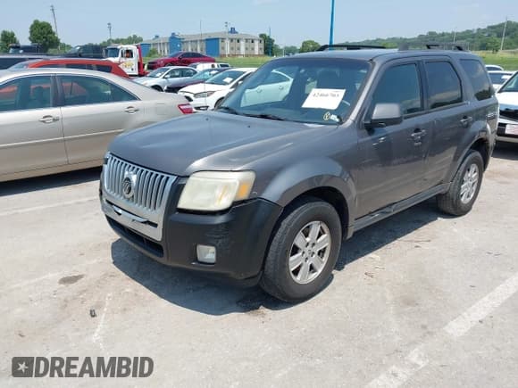 ✅ 2010 Mercury Mariner • VIN: 4M2CN8BG8AKJ19762 • Lot: 42466703. Listed on IAAI with 240,178 mi. Free auction sales archive from the USA and detailed vehicle history report at DreamBid. Image 2.