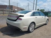 ✅ 2014 Lincoln MKZ • VIN: 3LN6L2G92ER814476 • Lot: 42768605. Listed on IAAI with 76,122 mi. Free auction sales archive from the USA and detailed vehicle history report at DreamBid. Image 4.