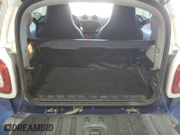 ✅ 2016 Smart fortwo Prime • VIN: WMEFJ5DA9GK053514 • Lot: 61554565. Wystawiony na Copart z przebiegiem 85 779 mil. Bezpłatny archiwum sprzedaży aukcyjnych z USA i szczegółowy raport historii pojazdu na DreamBid. Zdjęcie 10.