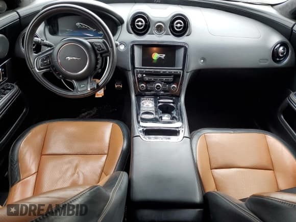 ✅ 2014 Jaguar XJ • VIN: SAJWA2EKXEMV64494 • Лот: 82634004. Опубликован ранее на Copart с пробегом 119 811 миль. Бесплатный доступ к архиву аукционных продаж из США и подробный отчёт об истории автомобиля на DreamBid. Изображение 8.