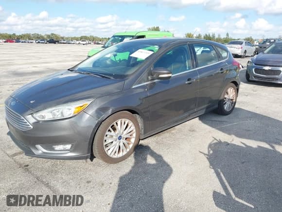 ✅ 2017 Ford Focus Titanium • VIN: 1FADP3N28HL206742 • Лот: 43807219. Опубликован ранее на IAAI с пробегом 118 232 миль. Бесплатный доступ к архиву аукционных продаж из США и подробный отчёт об истории автомобиля на DreamBid. Изображение 2.