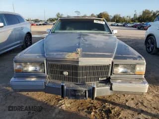✅ 1990 Cadillac Brougham • VIN: 1G6DW5472LR711206 • Lot: 75627814. Wystawiony na Copart z przebiegiem Nie podano. Bezpłatny archiwum sprzedaży aukcyjnych z USA i szczegółowy raport historii pojazdu na DreamBid. Zdjęcie 5.