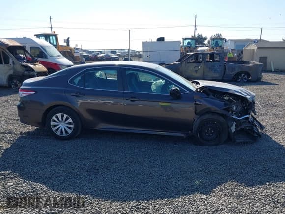 ✅ 2020 Toyota Camry Hybrid LE • VIN: 4T1C31AK9LU520765 • Лот: 43301945. Опубликован ранее на IAAI с пробегом 48 419 миль. Бесплатный доступ к архиву аукционных продаж из США и подробный отчёт об истории автомобиля на DreamBid. Изображение 13.