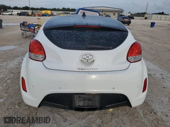 2012 Hyundai Veloster w/Red Int с VIN KMHTC6AD4CU076435, выставлен на аукционе Copart как лот 73015964 с пробегом 136 324 миль миль и Списание • Salvage title. История ставок и продаж доступна на DreamBid. Изображение 6.