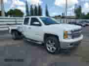 2015 Chevrolet Silverado 1500 LT with VIN 1GCRCREC8FZ362782, listed as a Copart auction lot 69407325 with 34,390 mi miles and Salvage title. Bid and sale history available at DreamBid. Image 4.