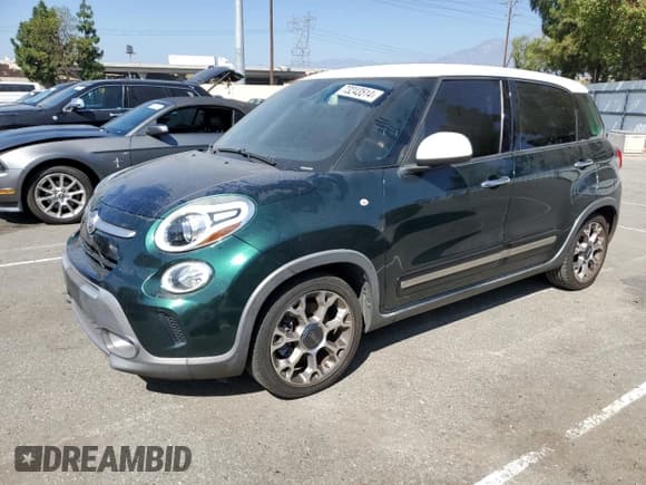 ✅ 2014 FIAT 500L Trekking • VIN: ZFBCFADH7EZ008751 • Lot: 73243514. Listed on Copart with 83,503 mi. Free auction sales archive from the USA and detailed vehicle history report at DreamBid. Image 1.
