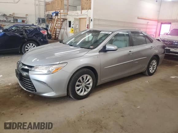2015 Toyota Camry LE с VIN 4T1BD1FK7FU163219, выставлен на аукционе Copart как лот 67203785 с пробегом 122 689 миль миль и Списание • Salvage title. История ставок и продаж доступна на DreamBid. Изображение 1.