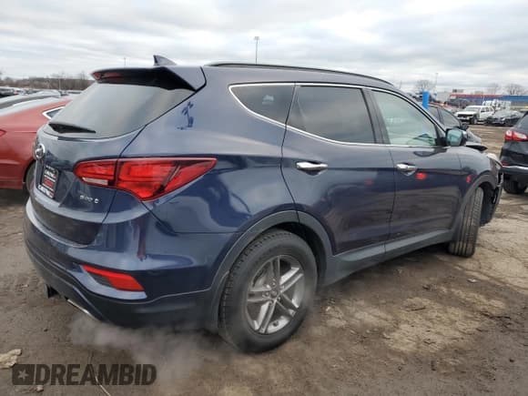 ✅ 2017 Hyundai Santa Fe 2.4L • VIN: 5XYZU3LB4HG448855 • Лот: 79426203. Опубликован ранее на Copart с пробегом 98 988 миль. Бесплатный доступ к архиву аукционных продаж из США и подробный отчёт об истории автомобиля на DreamBid. Изображение 3.