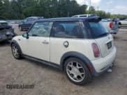 ✅ 2004 MINI Hardtop S • VIN: WMWRE33434TD81033 • Lot: 63759035. Listed on Copart with 319,648 mi. Free auction sales archive from the USA and detailed vehicle history report at DreamBid. Image 2.