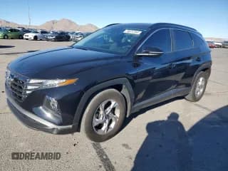 ✅ 2022 Hyundai Tucson SEL • VIN: 5NMJB3AE9NH145605 • Lot: 79571704. Wystawiony na Copart z przebiegiem 42 597 mil. Bezpłatny archiwum sprzedaży aukcyjnych z USA i szczegółowy raport historii pojazdu na DreamBid. Zdjęcie 1.