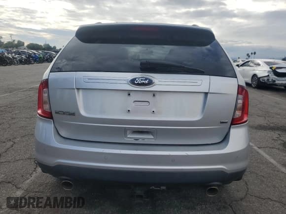 ✅ 2014 Ford Edge SE • VIN: 2FMDK4GC4EBB30321 • Lot: 81233705. Wystawiony na Copart z przebiegiem 181 016 mil. Bezpłatny archiwum sprzedaży aukcyjnych z USA i szczegółowy raport historii pojazdu na DreamBid. Zdjęcie 6.