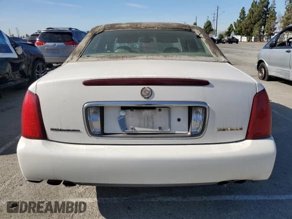 ✅ 2001 Cadillac DeVille • VIN: 1G6KD54Y91U113288 • Lot: 64148635. Wystawiony na Copart z przebiegiem 81 204 mil. Bezpłatny archiwum sprzedaży aukcyjnych z USA i szczegółowy raport historii pojazdu na DreamBid. Zdjęcie 6.
