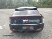 ✅ 2023 Kia EV6 Wind • VIN: KNDC34LA6P5610126 • Lot: 71825534. Wystawiony na Copart z przebiegiem 55 662 mil. Bezpłatny archiwum sprzedaży aukcyjnych z USA i szczegółowy raport historii pojazdu na DreamBid. Zdjęcie 6.