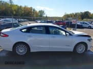 ✅ 2014 Ford Fusion SE Hybrid • VIN: 3FA6P0LU9ER252475 • Lot: 43476877. Listed on IAAI with 170,070 mi. Free auction sales archive from the USA and detailed vehicle history report at DreamBid. Image 13.