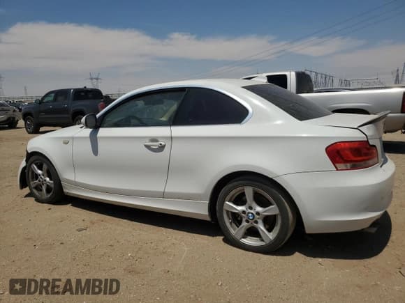 ✅ 2013 BMW 1 Series 128i • VIN: WBAUP7C54DVP25118 • Lot: 67860225. Listed on Copart with 94,358 mi. Free auction sales archive from the USA and detailed vehicle history report at DreamBid. Image 2.