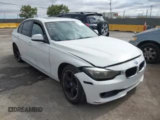 ✅ 2014 BMW 3 Series 328i • VIN: WBA3C1C59EK107056 • Lot: 42778687. Listed on IAAI with 106,786 mi. Free auction sales archive from the USA and detailed vehicle history report at DreamBid. Image 1.