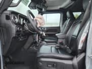 ✅ 2024 Jeep Wrangler Sahara • VIN: 1C4RJXP62RW146188 • Lot: 85575625. Listed on Copart with 32,765 mi. Free auction sales archive from the USA and detailed vehicle history report at DreamBid. Image 7.