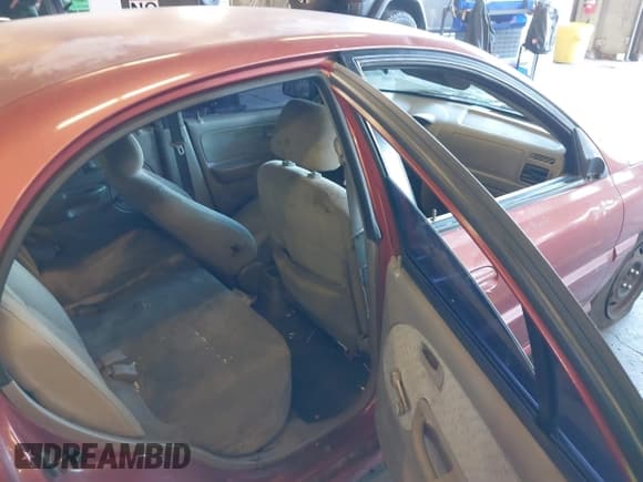 ✅ 2004 Kia Rio • VIN: KNADC125846331142 • Лот: 41982947. Опубликован ранее на IAAI с пробегом 181 904 миль. Бесплатный доступ к архиву аукционных продаж из США и подробный отчёт об истории автомобиля на DreamBid. Изображение 8.