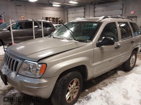 ✅ 2004 Jeep Grand Cherokee Laredo • VIN: 1J4GW48N24C220873 • Lot: 43705445. Listed on IAAI with 108,412 mi. Free auction sales archive from the USA and detailed vehicle history report at DreamBid. Image 2.