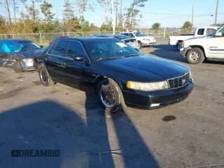 ✅ 2002 Cadillac Seville Luxury SLS • VIN: 1G6KS54Y82U305194 • Lot: 40978923. Wystawiony na IAAI z przebiegiem 115 813 mil. Bezpłatny archiwum sprzedaży aukcyjnych z USA i szczegółowy raport historii pojazdu na DreamBid. Zdjęcie 1.