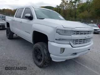 2016 Chevrolet Silverado 1500 LT z VIN 3GCUKREC5GG173229, wystawiony jako IAAI lot #43424899 z przebiegiem Nie podano mil oraz . Historia ofert i sprzedaży dostępna na DreamBid. Obrazek 1.