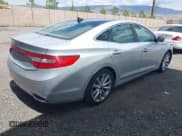 ✅ 2013 Hyundai Azera • VIN: KMHFH4JGXDA329113 • Lot: 42291091. Listed on IAAI with 152,147 mi. Free auction sales archive from the USA and detailed vehicle history report at DreamBid. Image 4.