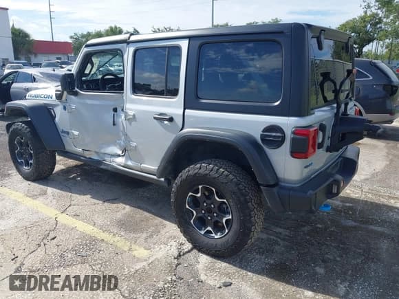 ✅ 2023 Jeep Wrangler Rubicon • VIN: 1C4JJXR63PW703424 • Лот: 42639653. Опубликован ранее на IAAI с пробегом 46 412 миль. Бесплатный доступ к архиву аукционных продаж из США и подробный отчёт об истории автомобиля на DreamBid. Изображение 3.
