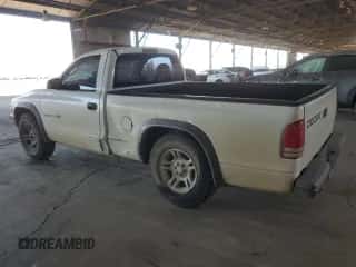 2002 Dodge Dakota z VIN 1B7FL16X02S714861, wystawiony jako Copart lot #74093644 z przebiegiem 164 199 mil mil oraz Szkoda całkowita • Salvage title. Historia ofert i sprzedaży dostępna na DreamBid. Obrazek 2.