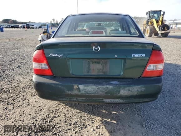 ✅ 2002 Mazda Protege DX • VIN: JM1BJ225021618037 • Lot: 92897355. Wystawiony na Copart z przebiegiem 160 409 mil. Bezpłatny archiwum sprzedaży aukcyjnych z USA i szczegółowy raport historii pojazdu na DreamBid. Zdjęcie 6.