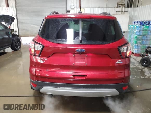 ✅ 2018 Ford Escape SE • VIN: 1FMCU9GD3JUB80336 • Lot: 92598255. Wystawiony na Copart z przebiegiem 42 431 mil. Bezpłatny archiwum sprzedaży aukcyjnych z USA i szczegółowy raport historii pojazdu na DreamBid. Zdjęcie 6.