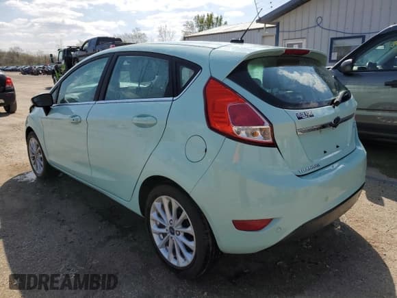 ✅ 2017 Ford Fiesta Titanium • VIN: 3FADP4FJ5HM131007 • Лот: 52972165. Опубликован ранее на Copart с пробегом 60 649 миль. Бесплатный доступ к архиву аукционных продаж из США и подробный отчёт об истории автомобиля на DreamBid. Изображение 2.