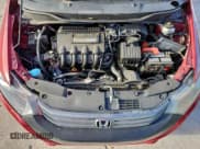 ✅ 2010 Honda Insight EX • VIN: JHMZE2H76AS029271 • Lot: 96059745. Listed on Copart with 82,748 mi. Free auction sales archive from the USA and detailed vehicle history report at DreamBid. Image 11.