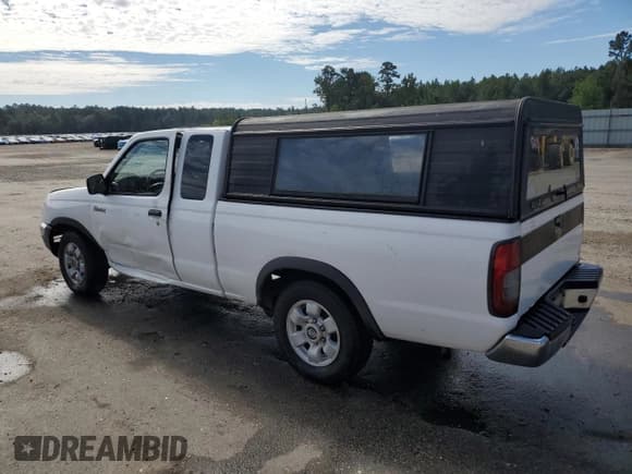 ✅ 1998 Nissan Frontier XE • VIN: 1N6DD26S5WC311065 • Lot: 84643135. Listed on Copart with 212,985 mi. Free auction sales archive from the USA and detailed vehicle history report at DreamBid. Image 2.