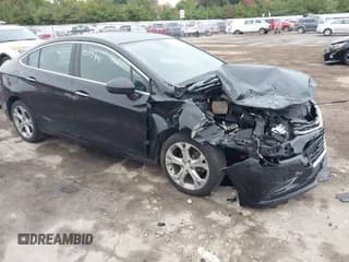 ✅ 2018 Chevrolet Cruze Premier • VIN: 1G1BF5SM1J7141701 • Лот: 43449111. Опубликован ранее на IAAI с пробегом 128 825 миль. Бесплатный доступ к архиву аукционных продаж из США и подробный отчёт об истории автомобиля на DreamBid. Изображение 1.