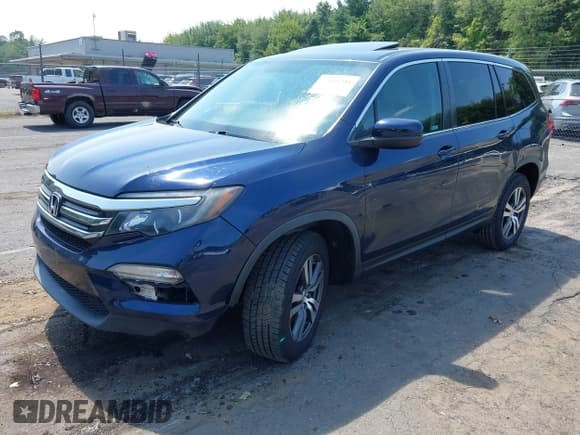 ✅ 2018 Honda Pilot EX-L • VIN: 5FNYF6H5XJB013698 • Lot: 42986201. Listed on IAAI with 63,873 mi. Free auction sales archive from the USA and detailed vehicle history report at DreamBid. Image 2.